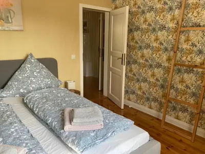 Ein Bett oder Betten in einem Zimmer der Unterkunft Grosse Galeriewohnung mit Sauna Fondels Mühle