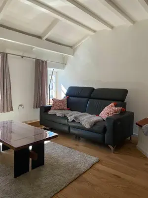 Ein Sitzbereich in der Unterkunft Ferienhaus Schiefertraum