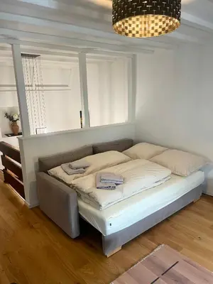 Ein Bett oder Betten in einem Zimmer der Unterkunft Ferienhaus Schiefertraum