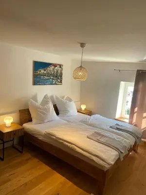 Ein Bett oder Betten in einem Zimmer der Unterkunft Ferienhaus Schiefertraum