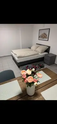 Ein Sitzbereich in der Unterkunft Ruhige, gemütliche Wohnung, 2 Betten