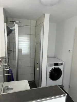 Ein Badezimmer in der Unterkunft Trappe's Maar-Häuschen
