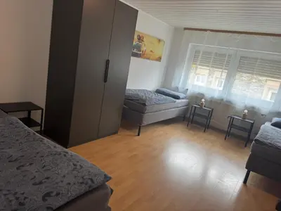 Ein Bett oder Betten in einem Zimmer der Unterkunft Team Haus für 11 Personen