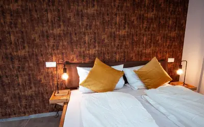 Ein Bett oder Betten in einem Zimmer der Unterkunft Fewo Rieslingglück - Urlaub im Wein- und Ferienort Bekond