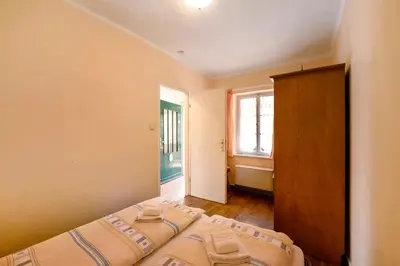Ein Bett oder Betten in einem Zimmer der Unterkunft Kavaliershäuschen - Urlaub auf dem Weingut