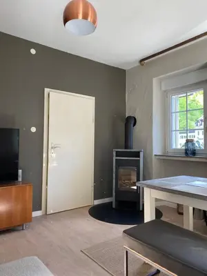 Ein Sitzbereich in der Unterkunft Ferienhaus Alfbach