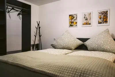 Ein Bett oder Betten in einem Zimmer der Unterkunft Apartment Alte Schule Zell