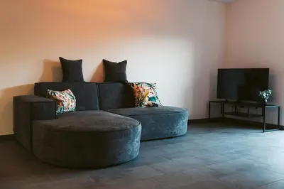 Ein Sitzbereich in der Unterkunft Apartment Alte Schule Zell