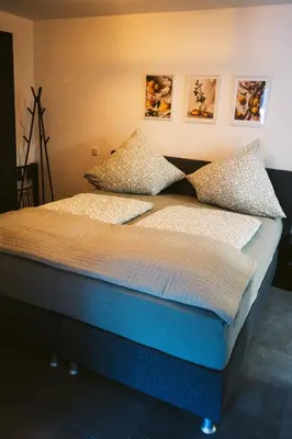 Ein Bett oder Betten in einem Zimmer der Unterkunft Apartment Alte Schule Zell