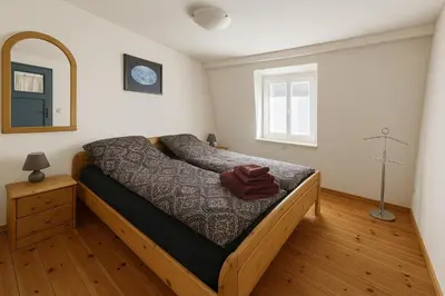 Ein Bett oder Betten in einem Zimmer der Unterkunft Moselglocke Urlaub im Herzen von Zell