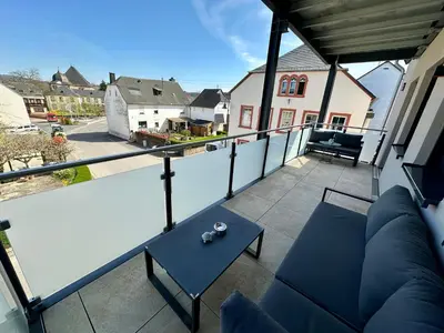 Ein Sitzbereich in der Unterkunft Neue Fewo Mosel-Glück - Urlaub im Wein- und Ferienort Bekond - Direkte Autobahnanbindung nach Trier & Luxembourg