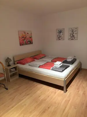 Ein Bett oder Betten in einem Zimmer der Unterkunft Ferienwohnungen im Taunusblick