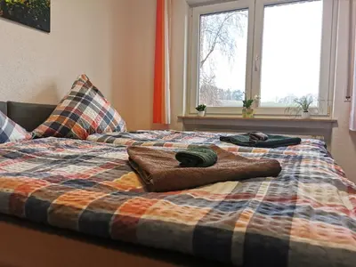 Ein Bett oder Betten in einem Zimmer der Unterkunft Speedy's Gästehaus