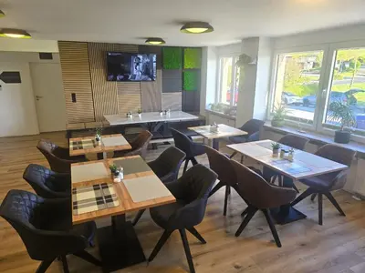 Ein Sitzbereich in der Unterkunft Speedy's Gästehaus