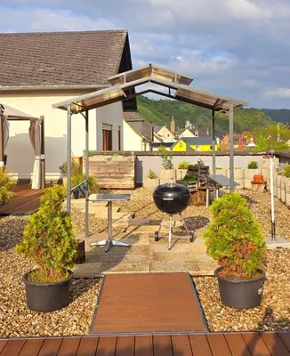 Ein Garten an der Unterkunft Haus Moselblick Hatzenport