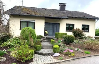 Ein Garten an der Unterkunft Quellenweg