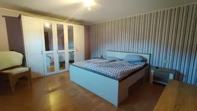Ein Bett oder Betten in einem Zimmer der Unterkunft Ferienwohnung Thielen