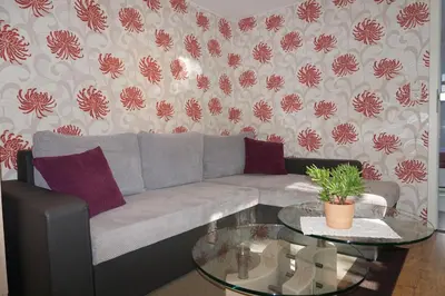 Ein Sitzbereich in der Unterkunft Ferienwohnung Am alten Holzweg
