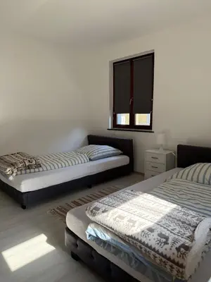 Ein Bett oder Betten in einem Zimmer der Unterkunft Adiferienwohnung1