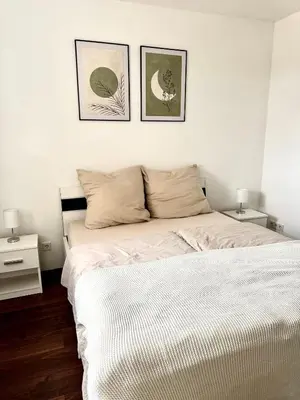 Ein Bett oder Betten in einem Zimmer der Unterkunft Ferienwohnung Enders