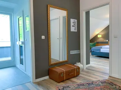 Ein Bett oder Betten in einem Zimmer der Unterkunft Happy Place Ferienwohnung mit Moselpanoramablick, Dachterrasse und Sauna