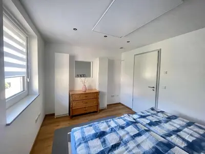 Ein Bett oder Betten in einem Zimmer der Unterkunft Ferienwohnung Kostecki