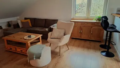 Ein Sitzbereich in der Unterkunft Ferienwohnung Vulkaneifel