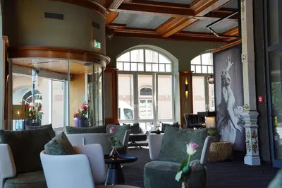 Ein Sitzbereich in der Unterkunft Hotel Porta Nigra VICTUS