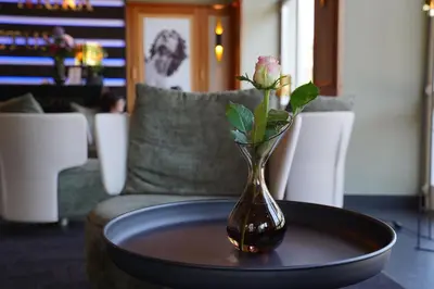 Ein Sitzbereich in der Unterkunft Hotel Porta Nigra VICTUS