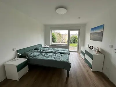Ein Bett oder Betten in einem Zimmer der Unterkunft Ferienwohnung Schwung