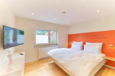 Ein Bett oder Betten in einem Zimmer der Unterkunft Oberhausen an der Nahe LIEBLINGSORT - Ferienappartements