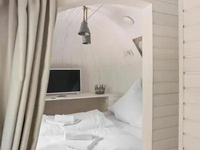 Ein Bett oder Betten in einem Zimmer der Unterkunft Iglucraft Tiny Haus im Naheland I Grill I Wasserspielpatz I W-LAN