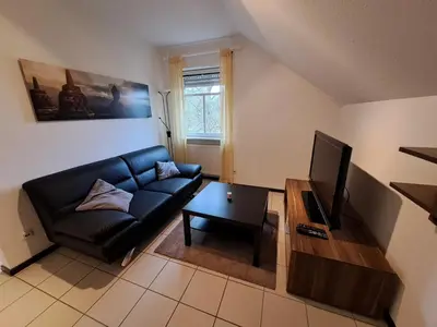 Ein Sitzbereich in der Unterkunft Kronenhaus