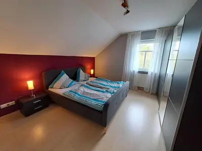 Ein Bett oder Betten in einem Zimmer der Unterkunft Kronenhaus
