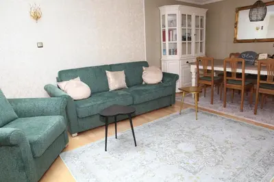 Ein Sitzbereich in der Unterkunft Ferienwohnung Mayener Jung mit schönem Innenhof
