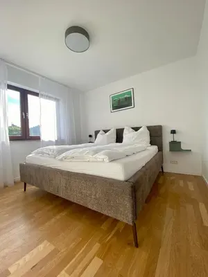 Ein Bett oder Betten in einem Zimmer der Unterkunft Ferienwohnung Wald & Ring