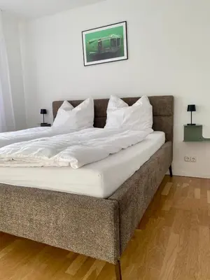 Ein Bett oder Betten in einem Zimmer der Unterkunft Ferienwohnung Wald & Ring