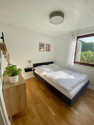 Ein Bett oder Betten in einem Zimmer der Unterkunft Ferienwohnung Wald & Ring