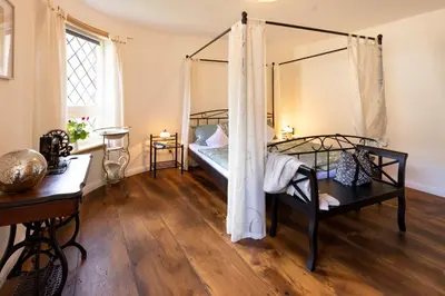 Ein Bett oder Betten in einem Zimmer der Unterkunft Am Bärenbrunnen