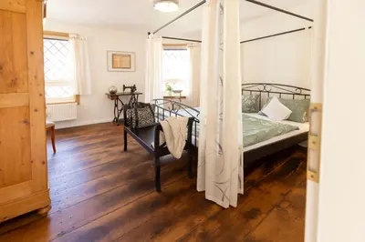 Ein Bett oder Betten in einem Zimmer der Unterkunft Am Bärenbrunnen