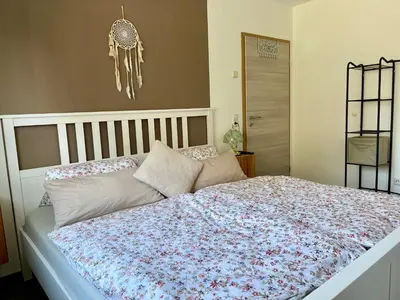 Ein Bett oder Betten in einem Zimmer der Unterkunft Ferienwohnung Zum Preußensteig I max 3 Gäste