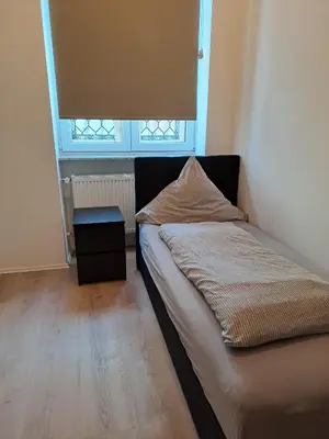 Ein Bett oder Betten in einem Zimmer der Unterkunft Monteurzimmer RLP - Ihr Zuhause auf Zeit!
