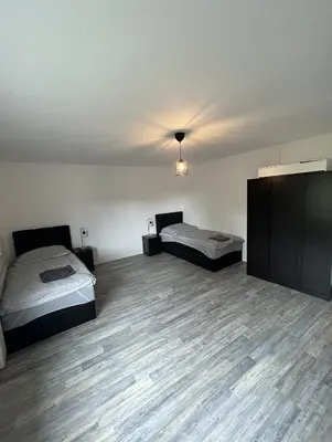 Ein Bett oder Betten in einem Zimmer der Unterkunft Monteurzimmer RLP - Ihr Zuhause auf Zeit!