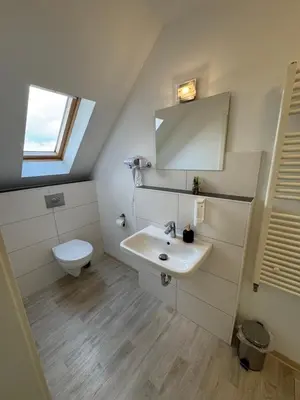 Ein Badezimmer in der Unterkunft Hotel und Restaurant Adriatic