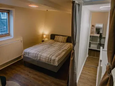 Ein Bett oder Betten in einem Zimmer der Unterkunft Apartment in Vallendar near Rhine Promenade