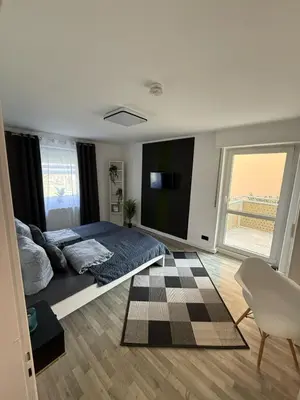 Ein Sitzbereich in der Unterkunft Schöne Wohnung in ruhiger Lage II