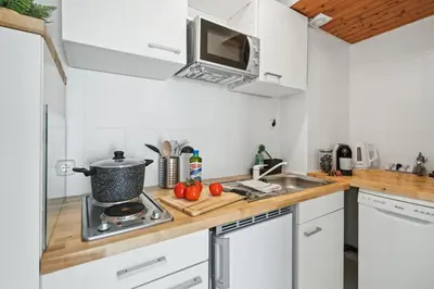 Küche/Küchenzeile in der Unterkunft Modernes Studio im Erdgeschoss - ZachaStay Koblenz Guels