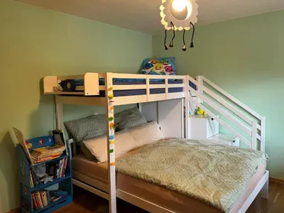 Ein Bett oder Betten in einem Zimmer der Unterkunft Ferienwohnung 