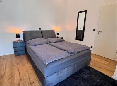 Ein Bett oder Betten in einem Zimmer der Unterkunft Ferienwohnung Kürenzer Auszeit