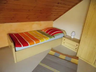 Ein Bett oder Betten in einem Zimmer der Unterkunft Ferienwohnung Inge Blum
